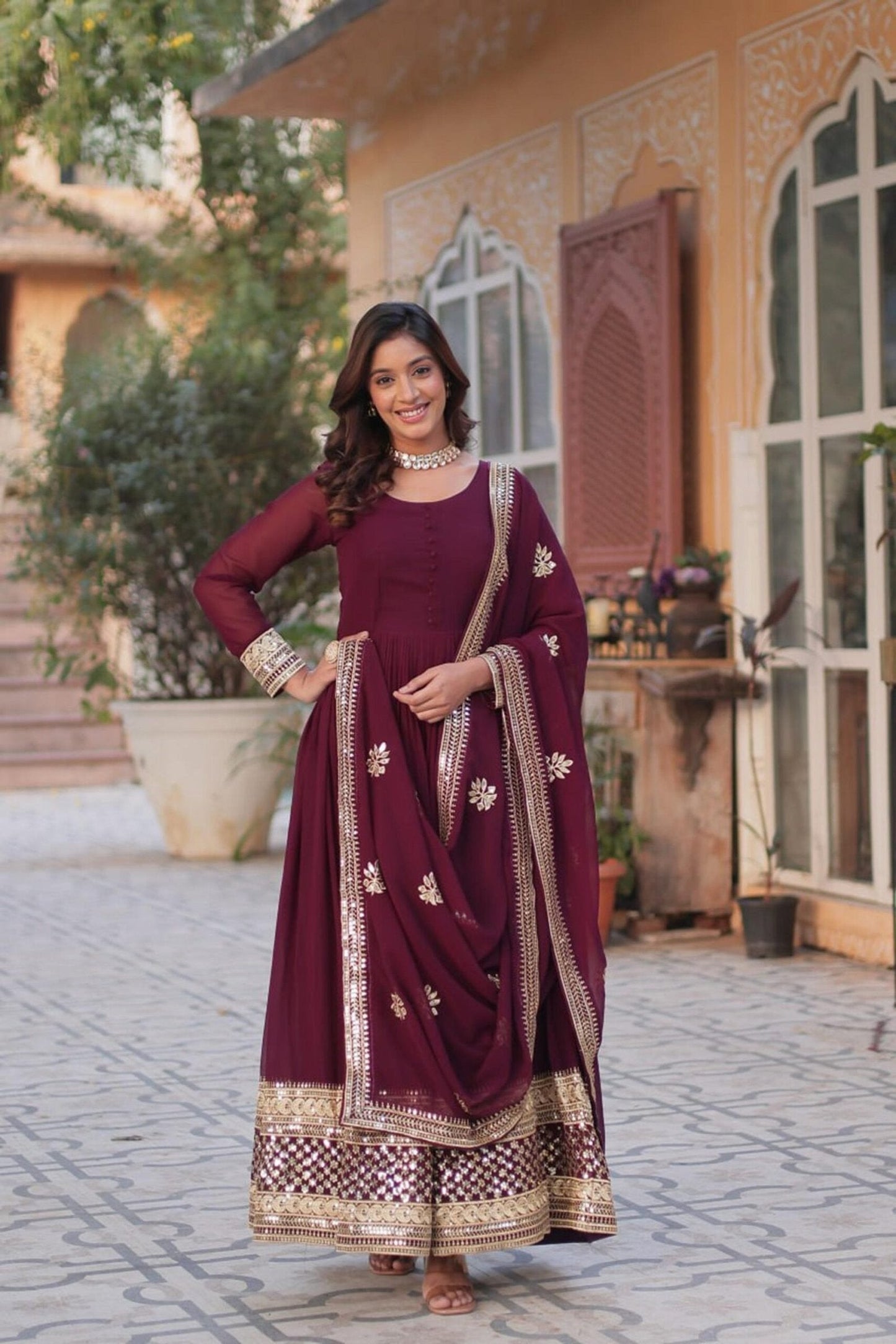 Sophisticated Maroon Zari Sequins Embroidered Gown