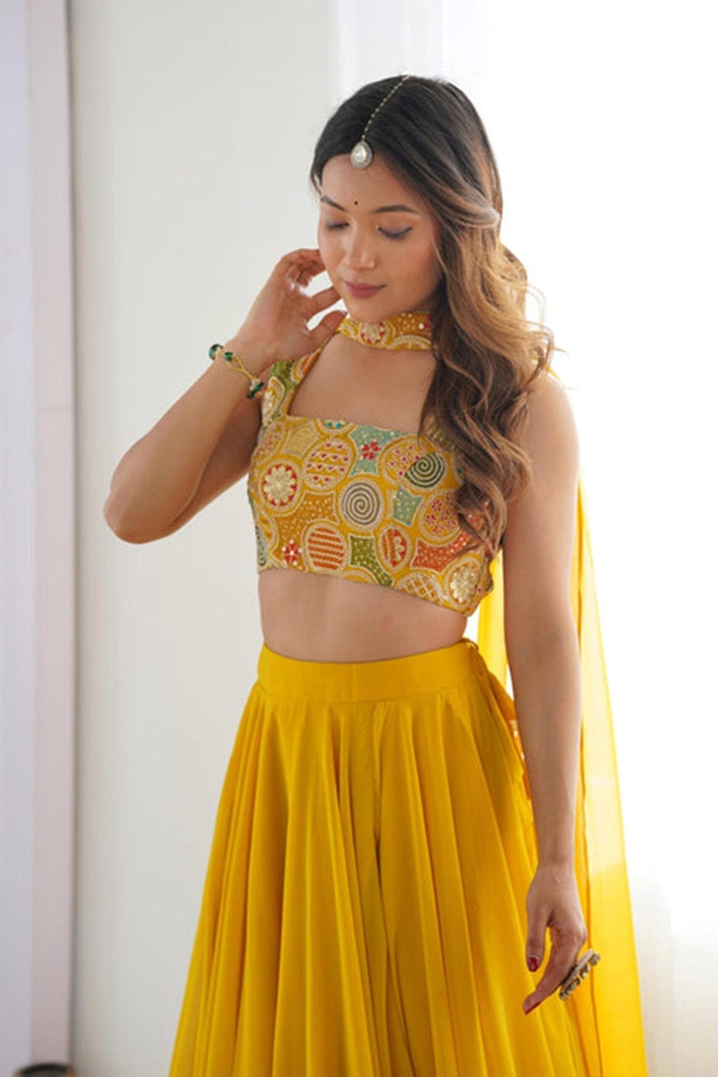 Yellow Color Fully Flared Lehenga Choli with Intricate Embroidery